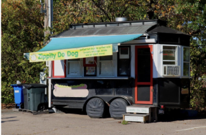 Zippity-Do-Dog is a hot dog stand that was founded in 2007. This food trolley is currently under the ownership of Roland Houle. It is located on Speen Street in Framingham, Massachusetts. “I took over the stand and have been running the stand since 2019,” Houle said. “I enjoy making hot dogs and providing a quick and easy meal for people on the go.” Houle, working through COVID, made an impact on the Framingham community with his outdoor trolley. 
